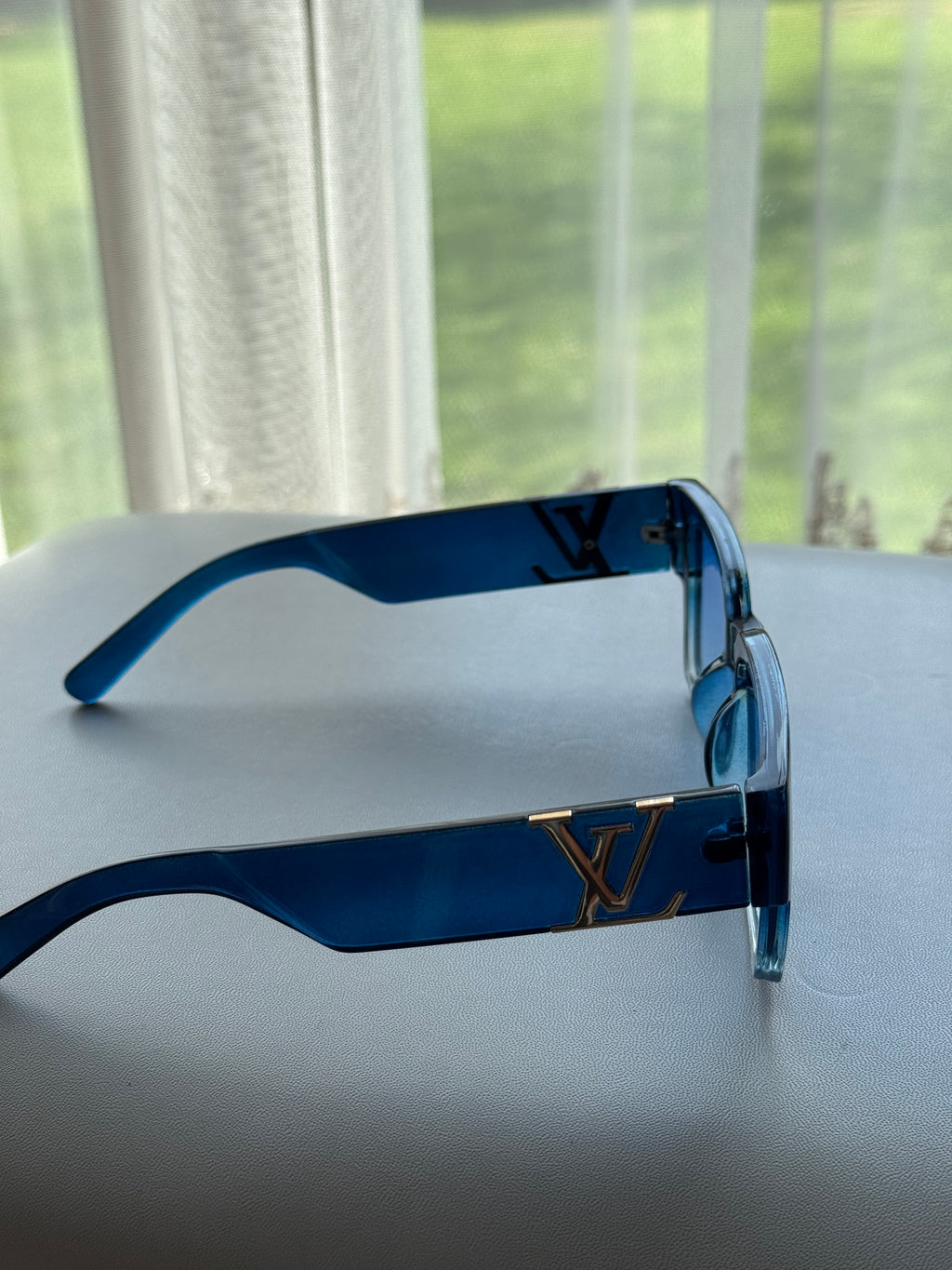Louis Vuitton Sunglasses – Transparent Light Blue/Gold